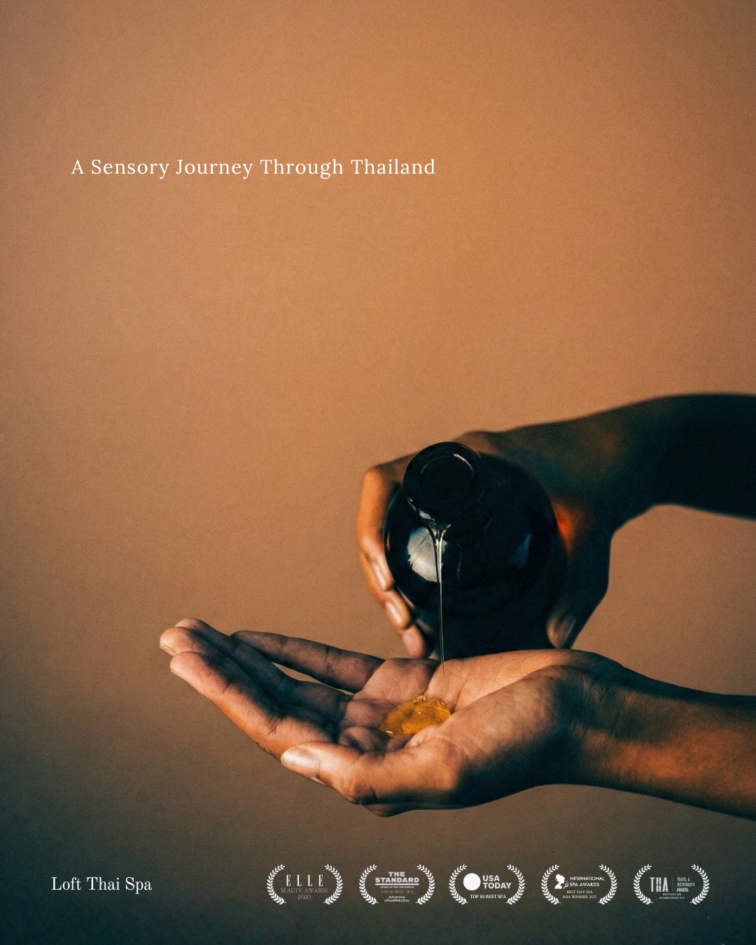 Therapist applying warm botanical oil during an aromatherapy massage at Loft Thai Spa Bangkok