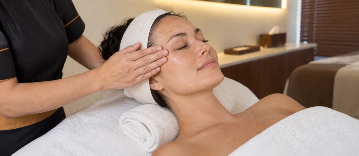 Illustration of gentle facial massage around the cheekbone and temple