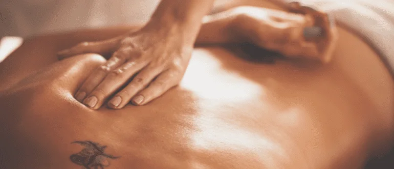 Professional Loft Thai therapist applying controlled deep-tissue pressure during massage in Bangkok