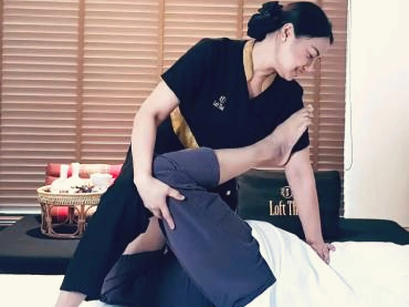 Assisted Thai stretch technique demonstrated in class